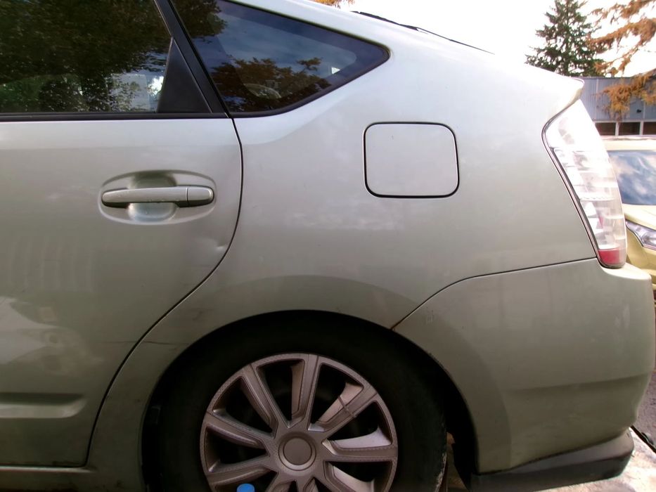 BŁOTNIK TYŁ LEWA ĆWIARTKA TOYOTA PRIUS II  03-09