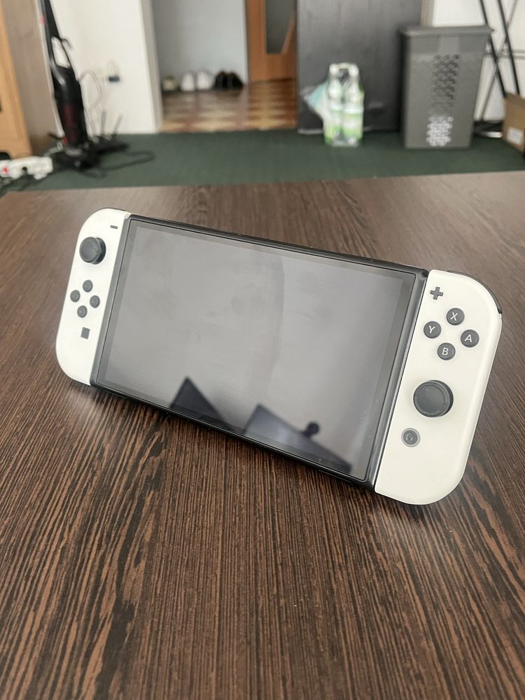 Nintendo Switch OLED + pad 8bitdo + Zelda BOTW