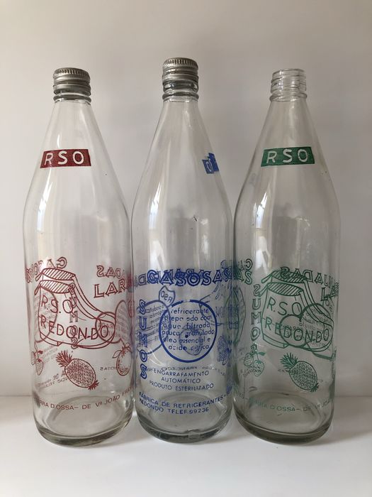 Garrafas de colecção de gasosa do redondo