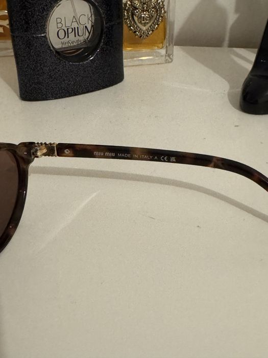 Óculos Miu Miu.