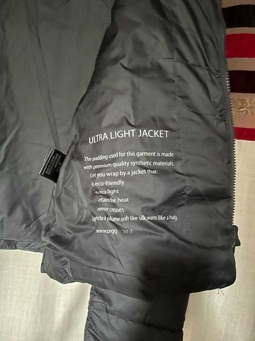 Жіноча сіра куртка з капюшоном