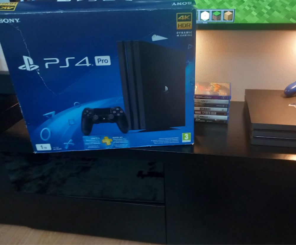 PS4 pro/ jogos e comando (caixa)