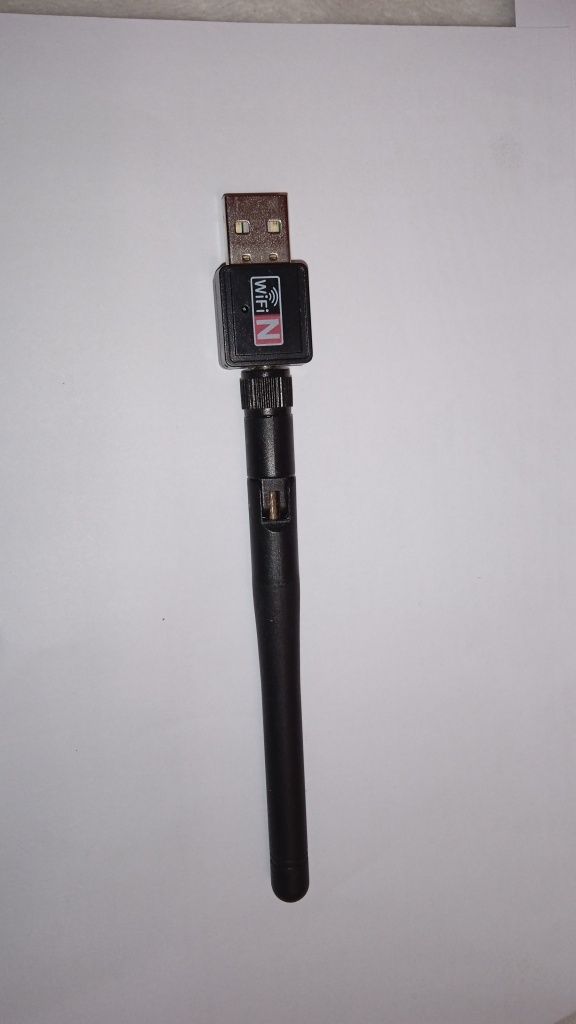 Бесповодной USB WI-FI адаптер. Подходит к телевизионному тюнеру Т2.