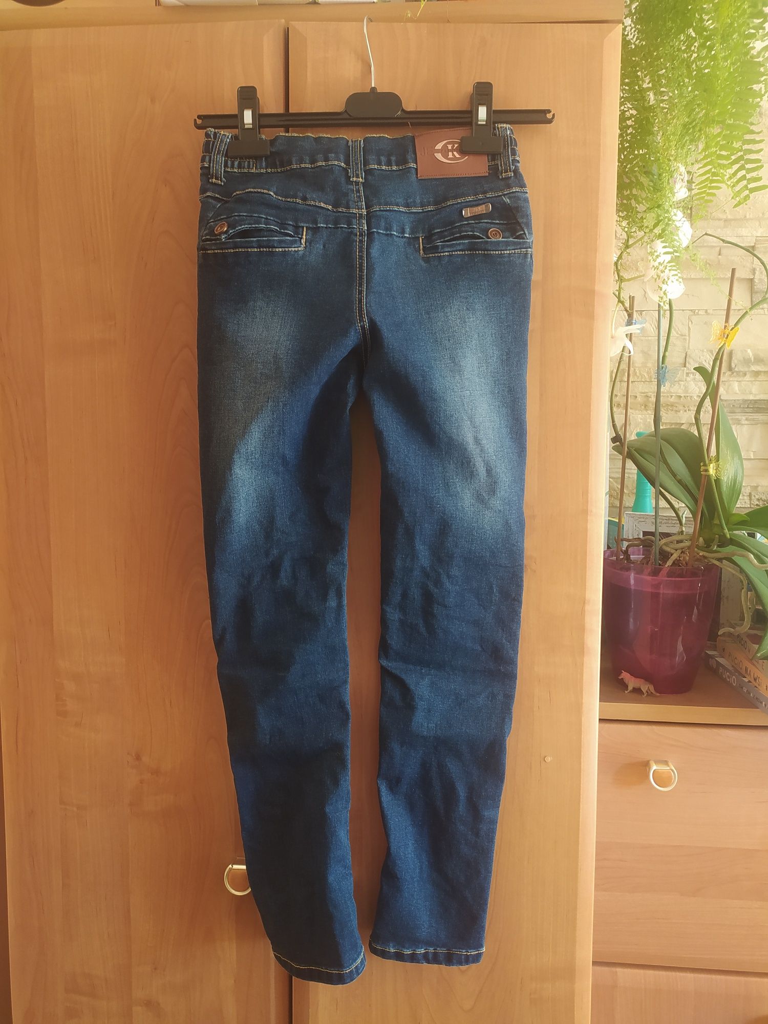 Spodnie jeansy dżinsy bawełniane rozmiar 146/152 Niebieski Księżyc