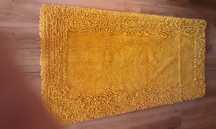 Vendo 2 tapetes amarelo mostarda 130x65 estão em muito bom estado