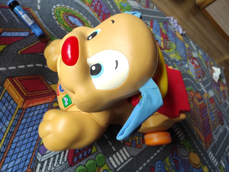 Pies jeździk pchacz Szczeniaczek Uczniaczek Fischer Price