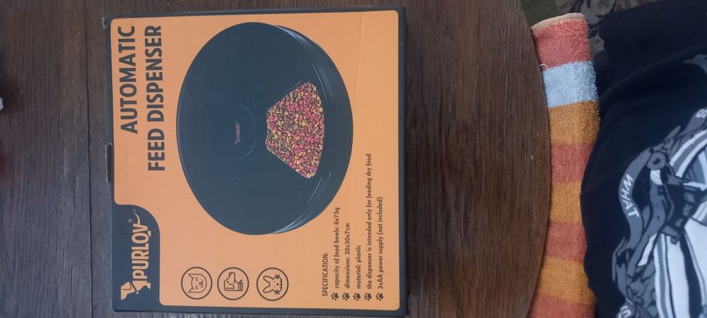 Авто-кармуша для котов собак и так далее.