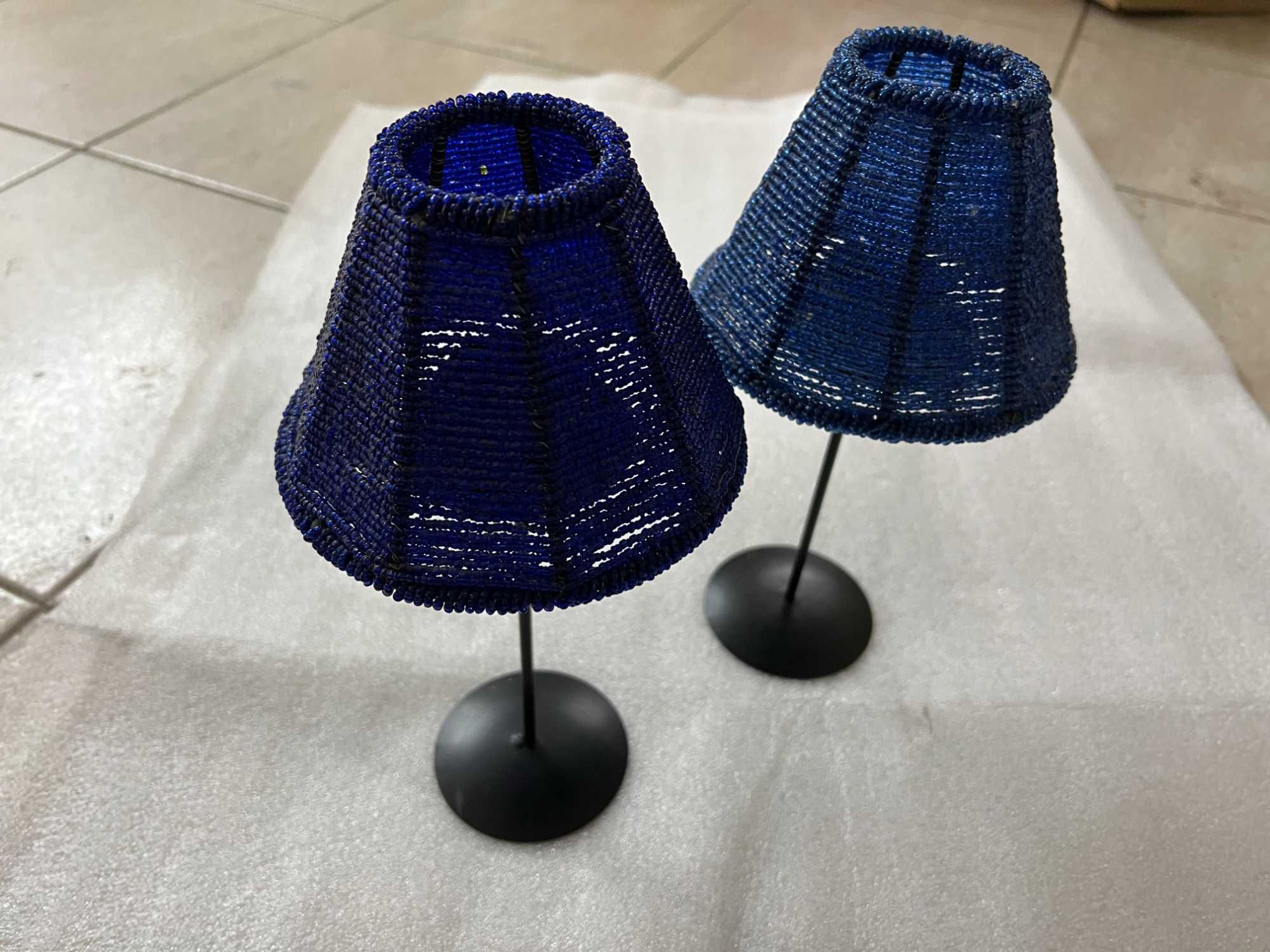 2 Suportes de velas com missangas