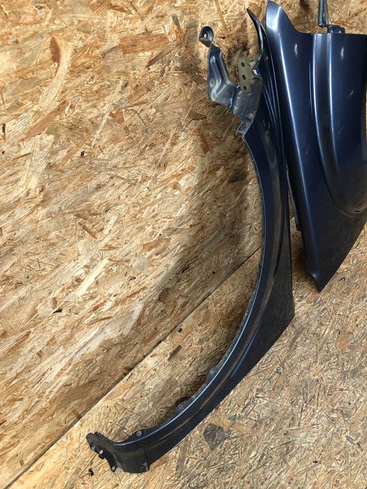 Błotnik przedni lewy prawy Pathfinder/Navara lift kolor b25