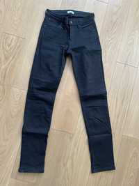 Czarne jeansy Wrangler 26x32
