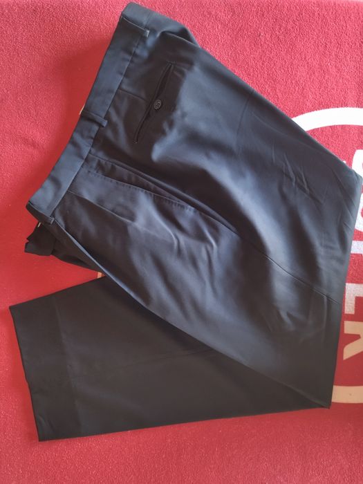 Fato novo completo e  Calças semi novas