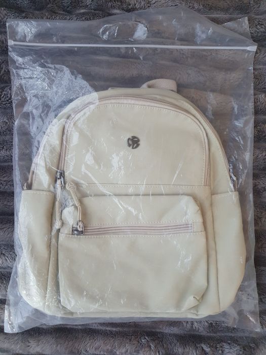 Mochila bege impermeável nova – ideal para o dia-a-dia