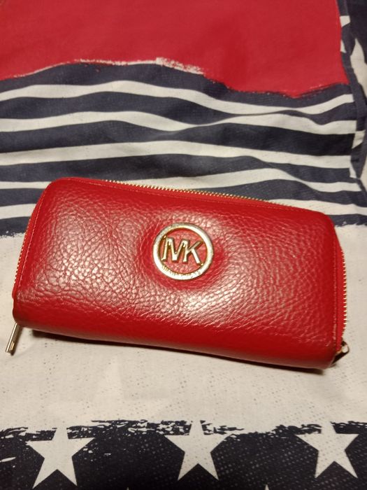 Sprzedam skórzany portfel damski MK