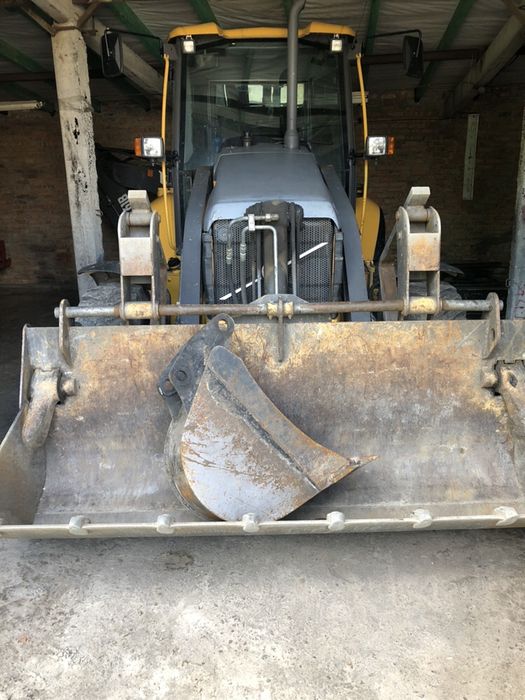 Послуги ескаватора-навантажувача