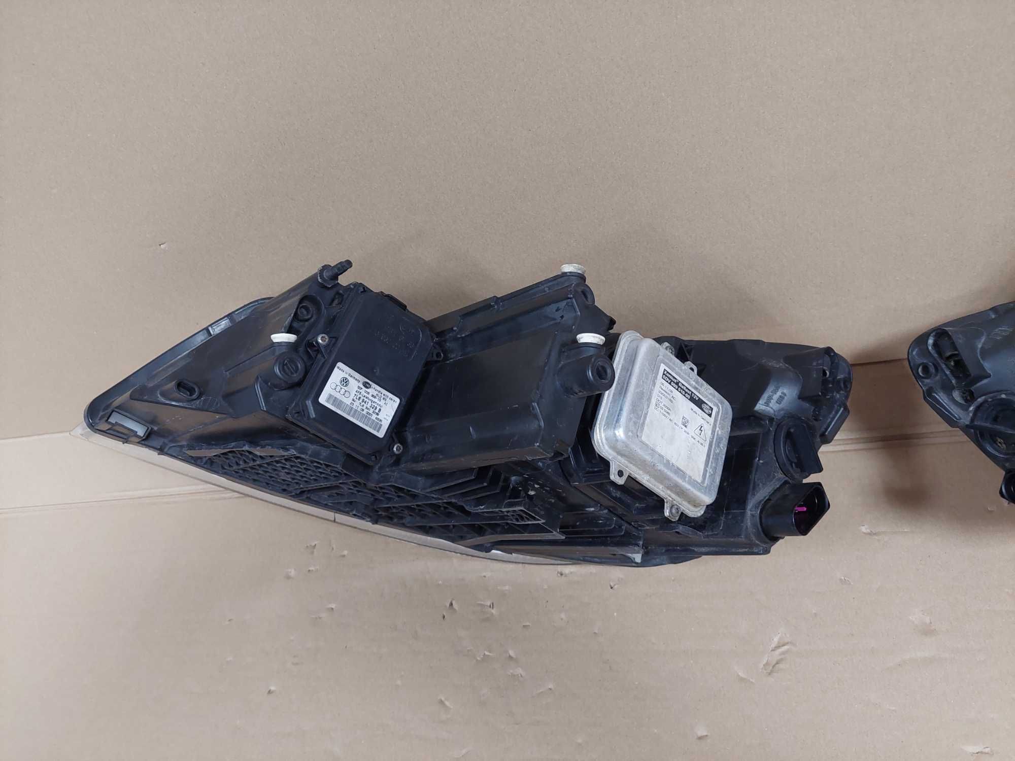 Octavia 2 II LIFT 08-12r lampa przód Bi Xenon skrętny lewa KPL EU BDB