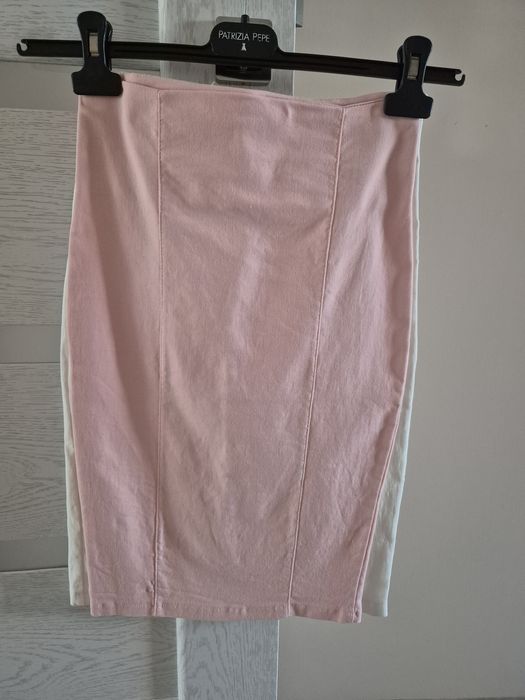 2 спідниці,в гарному стані.біла м,рожева 46р