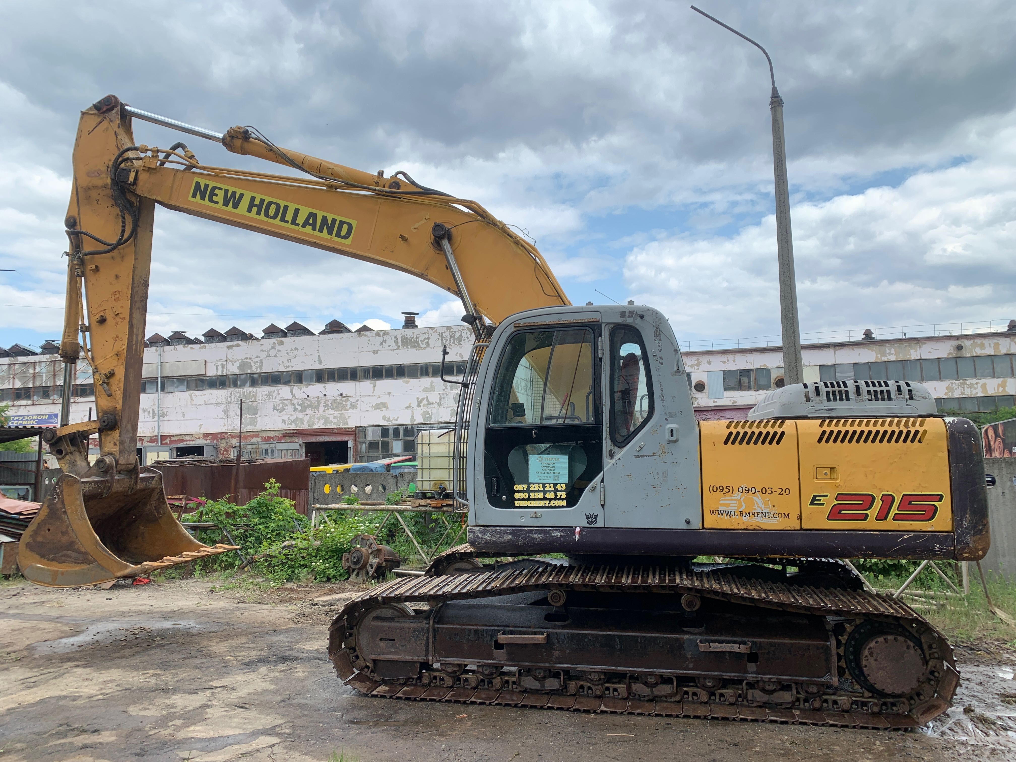 Гусеничний екскаватор NEW HOLLAND E215 Гусеничный экскаватор
