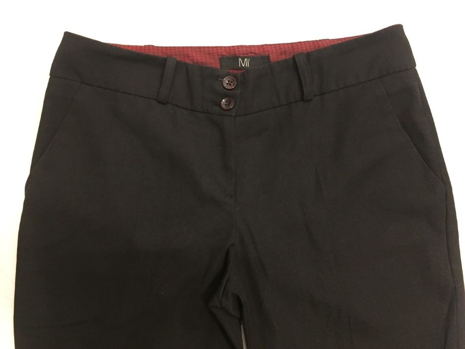 Фирмененные женские брюки Mi размер 40 (S-М) черные
