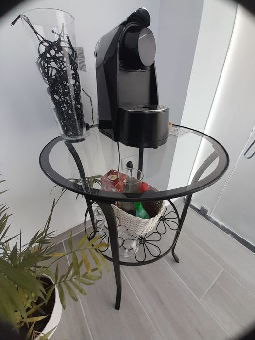 Mesa de vidro em ferro