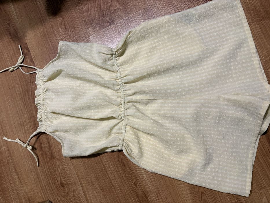 H&M kombinezon dziewczęcy żółty wiązany lato krótka nogawka 152