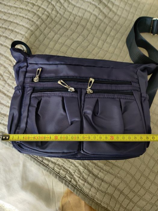 Нейлонова зручна сумка з великою кількість карманів