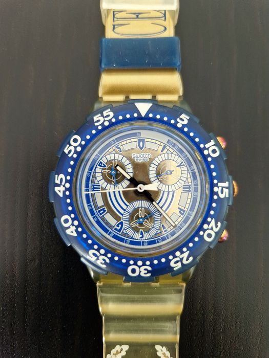 Relógio Swatch Aqua Chrono Olympic Special (SBZ102) NIKIPHOROS