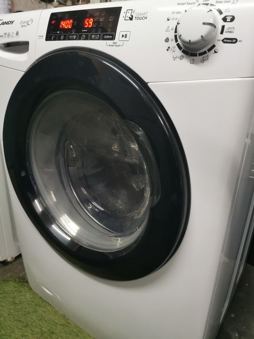 Máquina de lavar e secar roupa  candy 9kg 6kg  1400rpm faço entrega