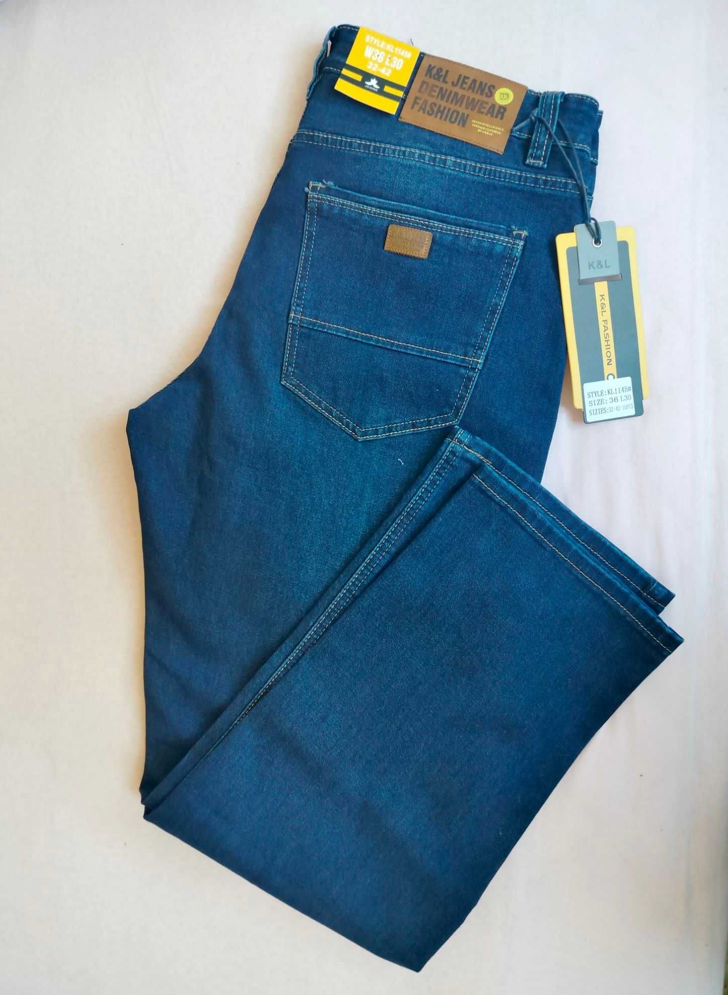 Nowe męskie spodnie jeansy K&L 36