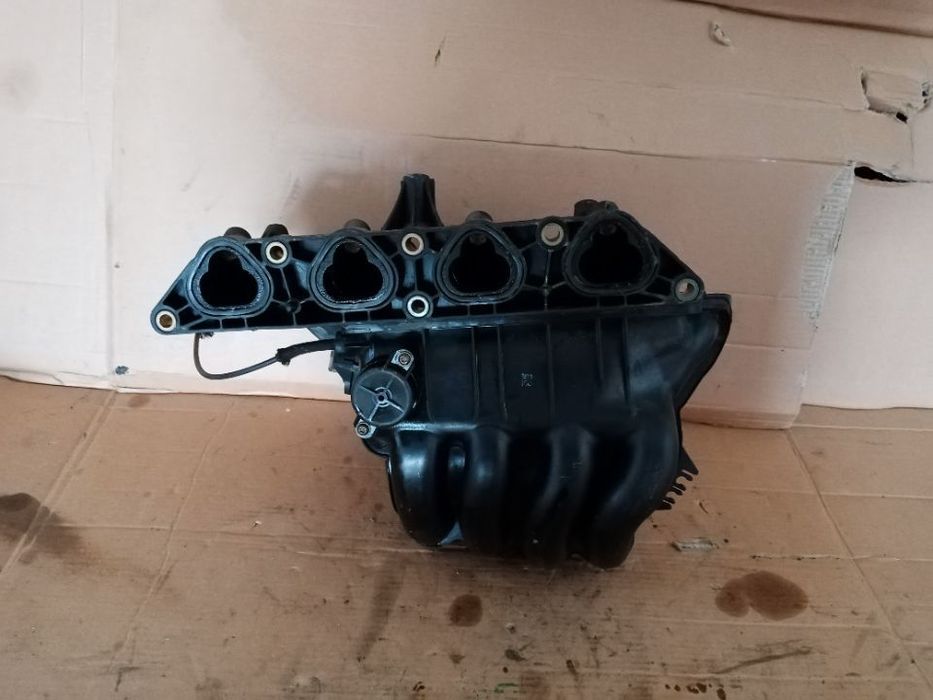 Kolektor ssący VW Golf IV 4 1.4 16V 036129711CE