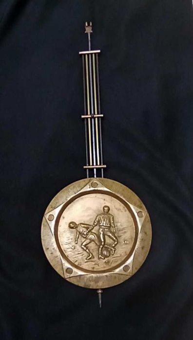 Маятник старинных часов