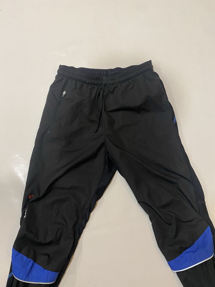 Spodnie sportowe firmy Trimex męskie roz S 30/32 fitness