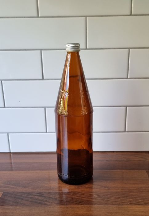 Butelka po wodzie Grodziskiej z nakrętką z PRL