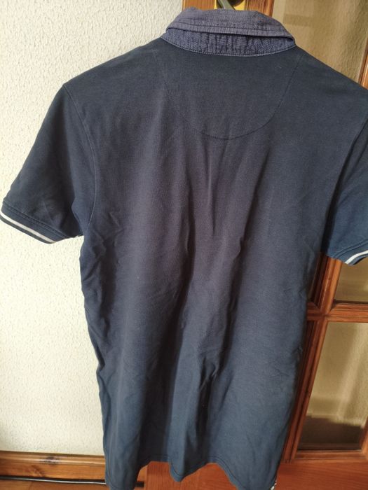 Polo azul marinho da marca Tiffosi