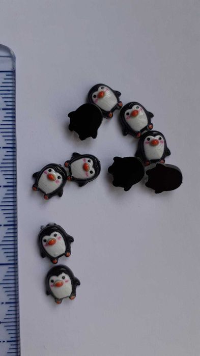 Pinguins em resina miniatura