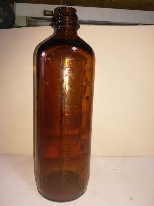Stara pusta butelka PRL z napisem trucizna 1 L