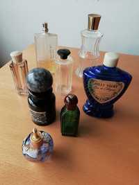 Conjunto de frascos de perfume usados.