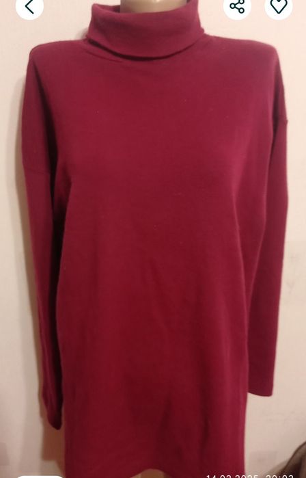 Жіночий гольф в рубчик .50 розміру.