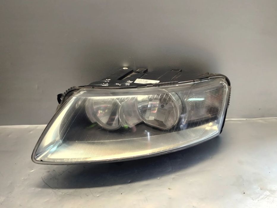LAMPA LEWA PRZÓD AUDI A6 C6 TYC PRZEDLIFT