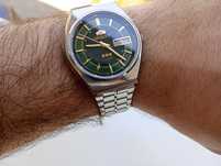Butelkowa zieleń zegarek orient crystal ni seiko citizen certina