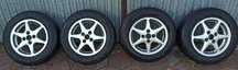 4 szt. Alufelgi 4x100 z ładnymi oponami 185/65 R14 komplet kół