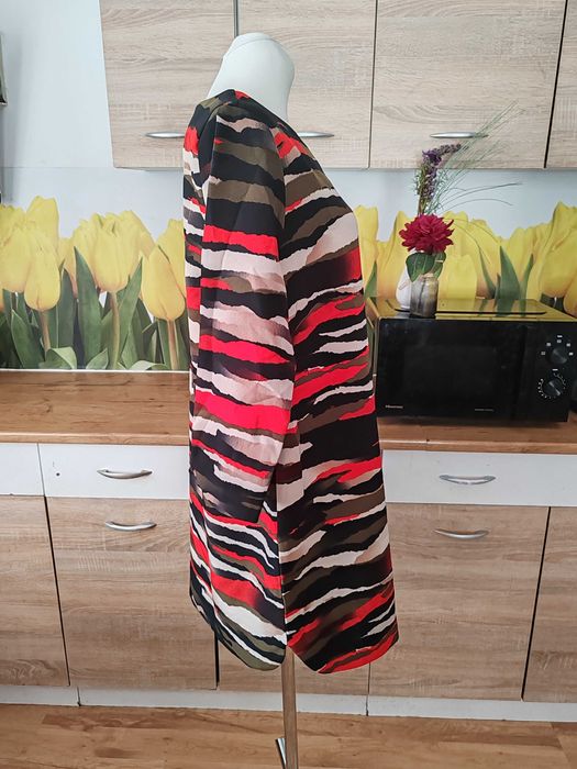 Śliczna koktajlowa mini sukienka H&M rozmiar 44 poliester/elastan