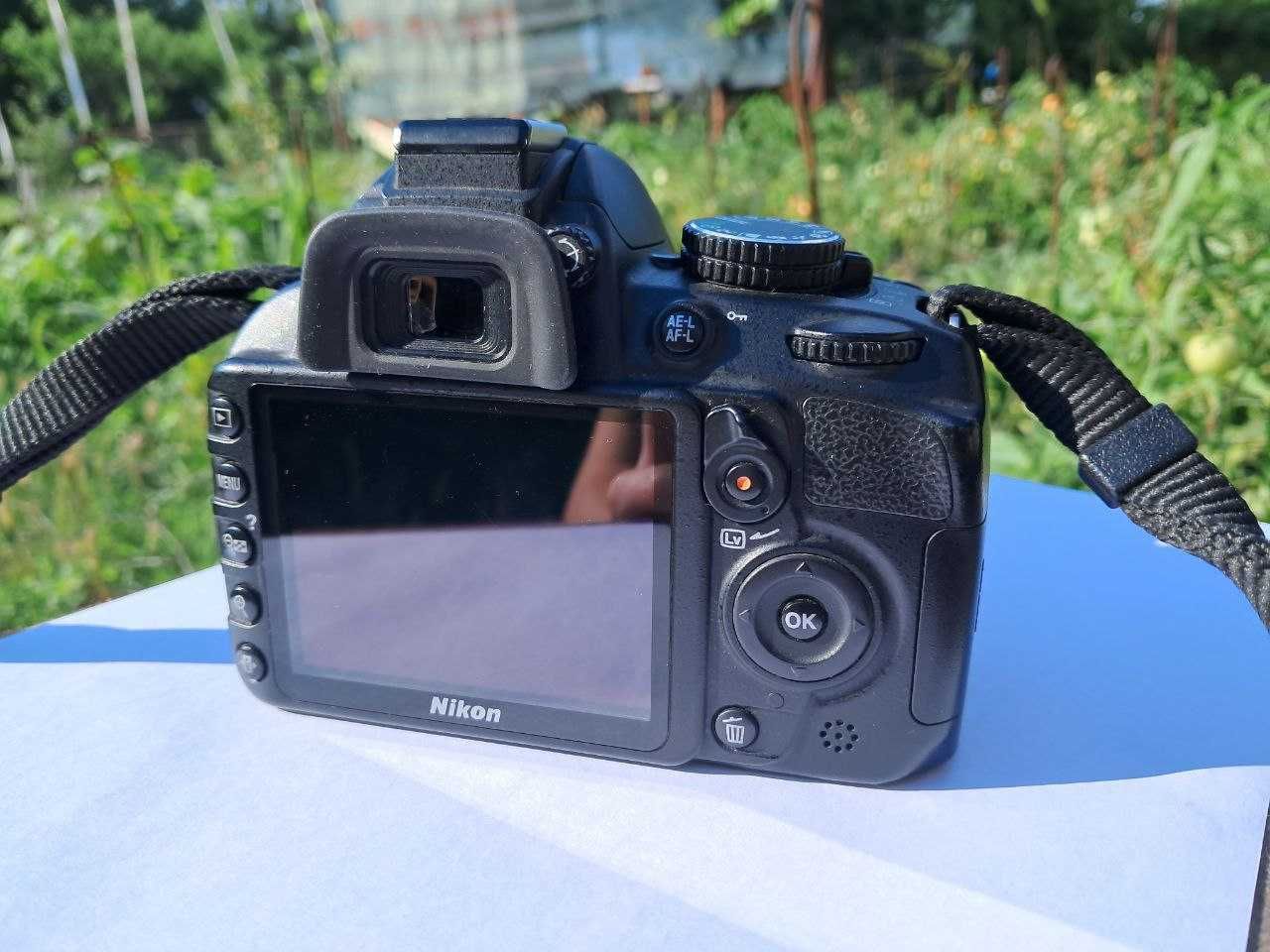 Nikon  D 3100.    .