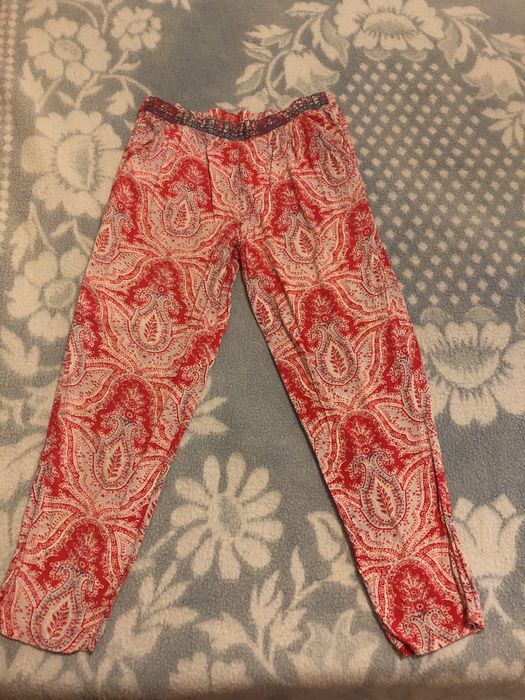 Calças de tecido fluidas