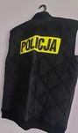 Kamizelka czarna z napisem policja