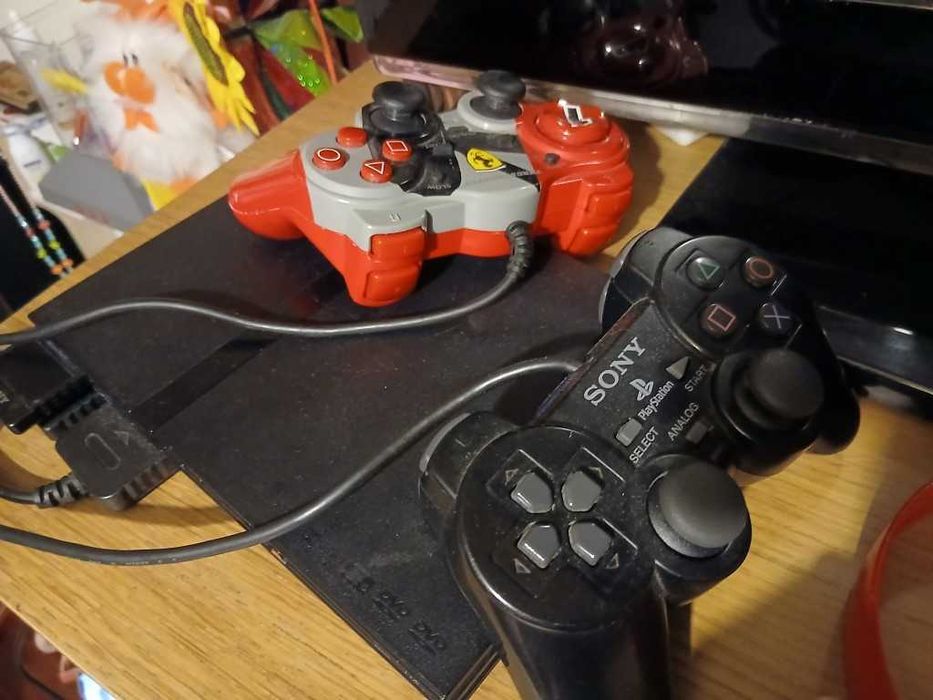 Ps2 Playstation 2 slim + 2 comandos + 20 jogos originais + c d memória