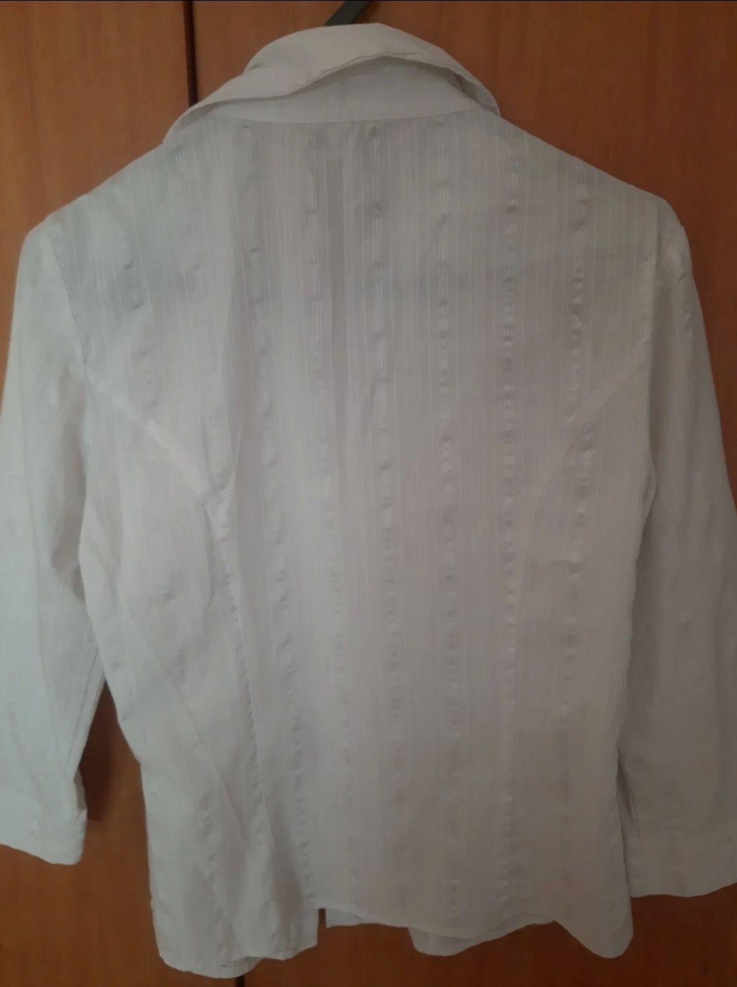 Camisa com colchetes