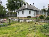 Продаж фасадного будинку та ділянки м.Українка