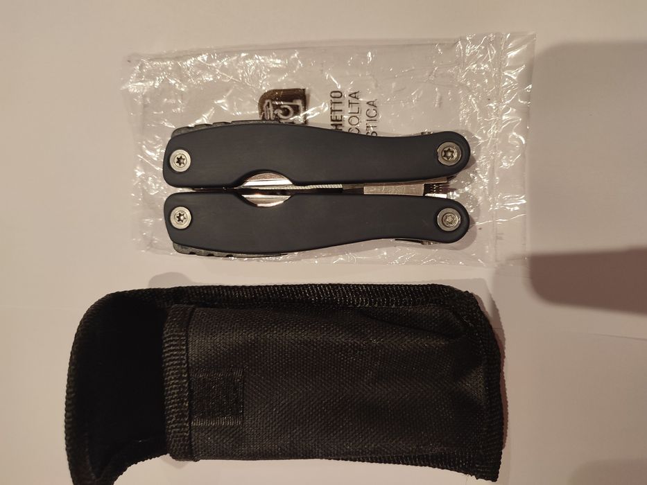 Новий мультітул, 9 в 1 , пласкогубці, кусачки, ніж , відкривачка...