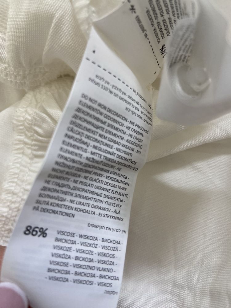 Elegancka biala smietankowa koszula o przedluzonym fasonie Reserved 38