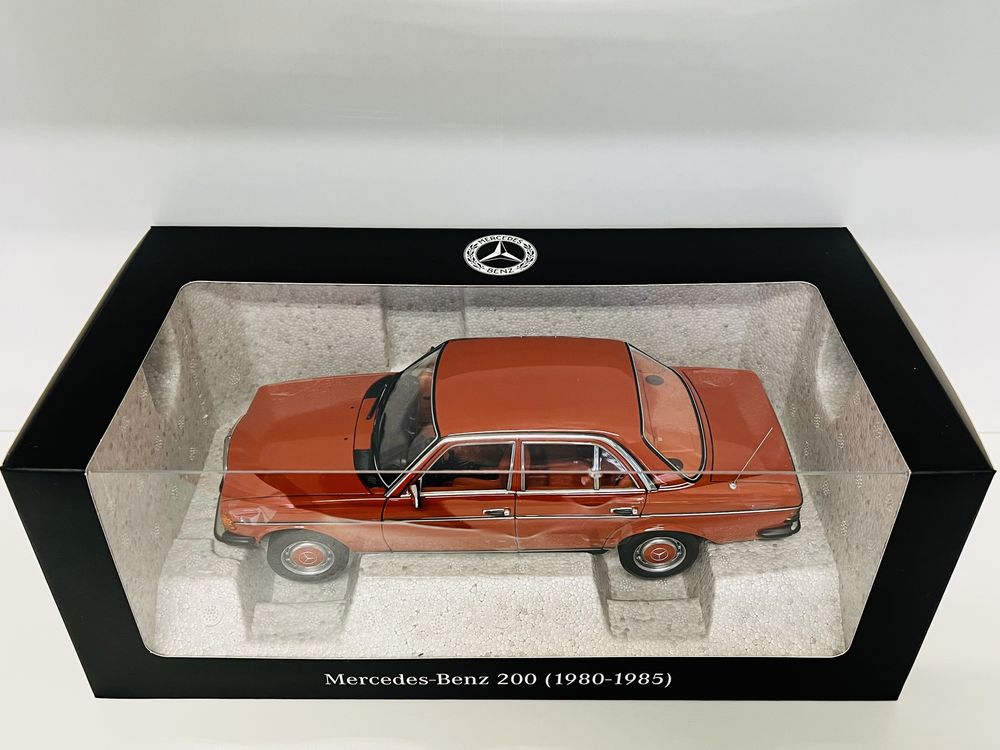 Mercedes 200 W123 „beczka” Norev (wersja dealerska) w skali 1/18